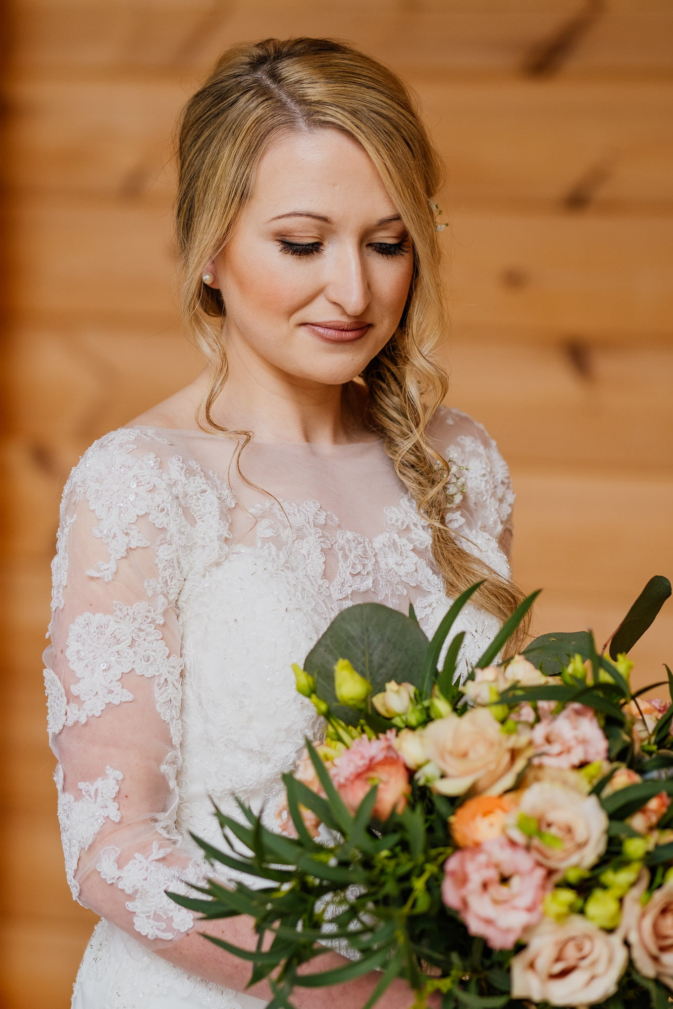 bride wedding portrait with flowers in bridal suite at styal lodge