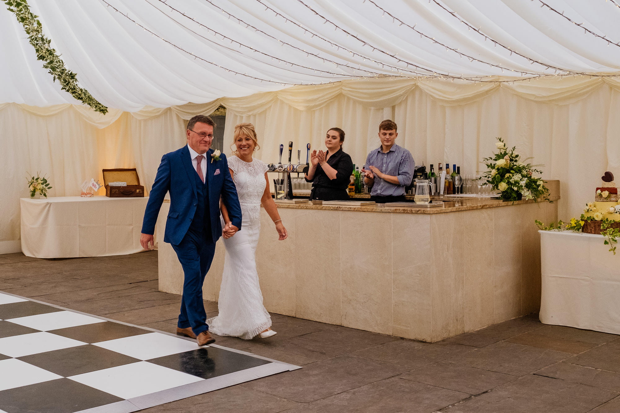 Bride and groom marquee entrance