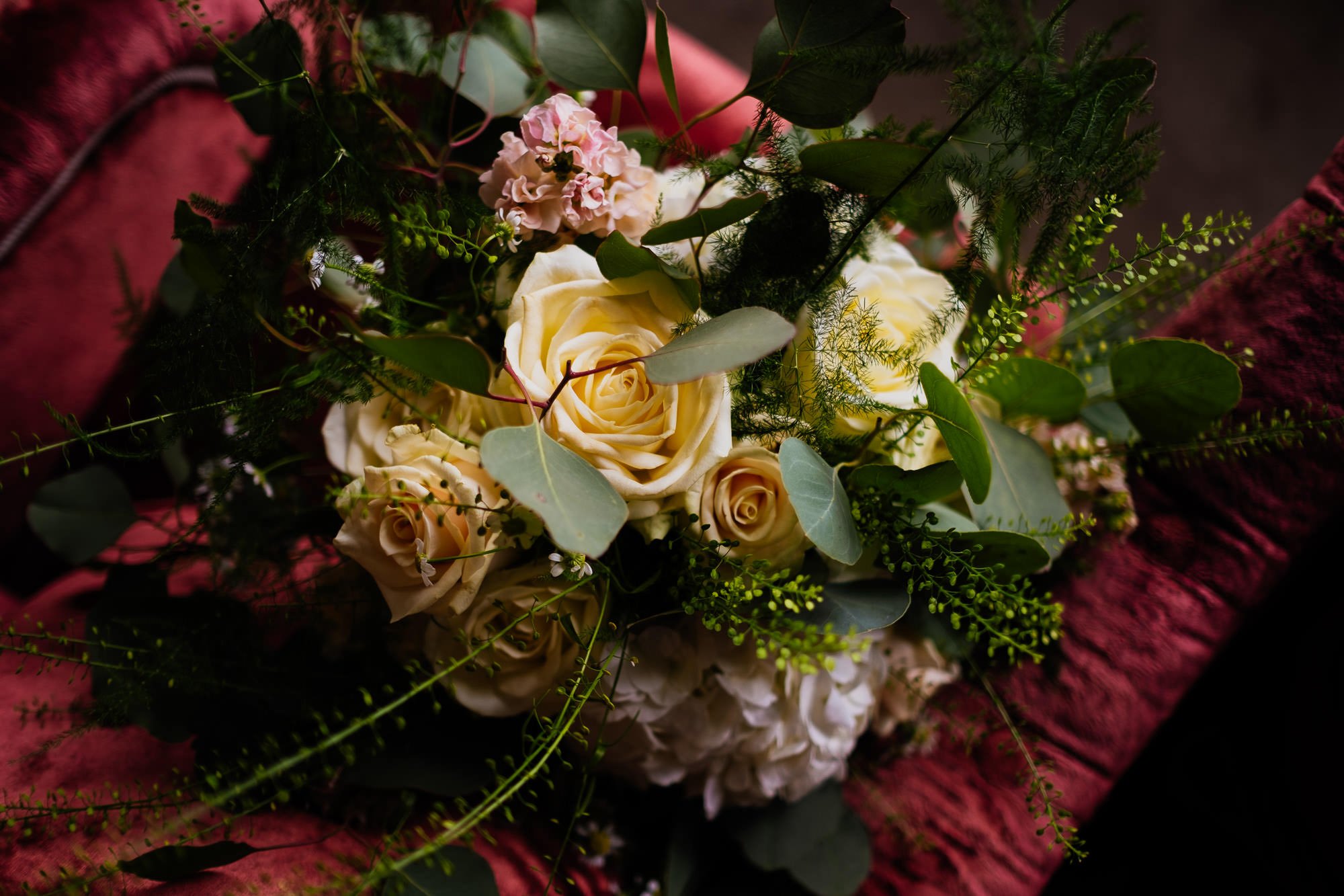 White rose and eucalyptus wedding flowers