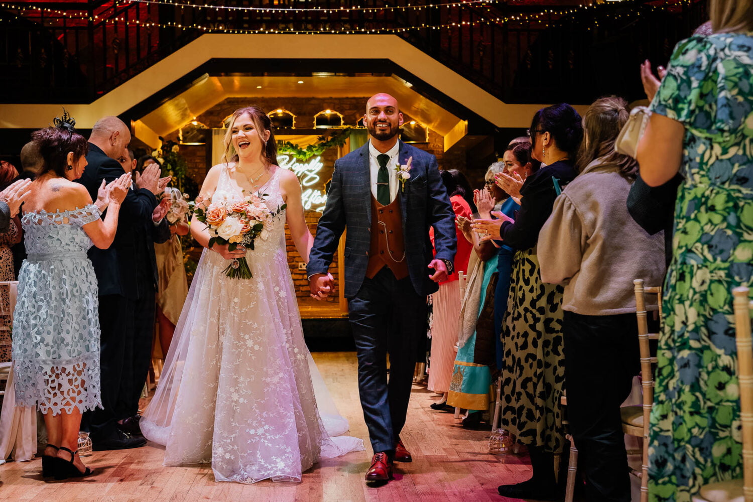 Newly married couple leaving their Engine Shed wedding ceremony