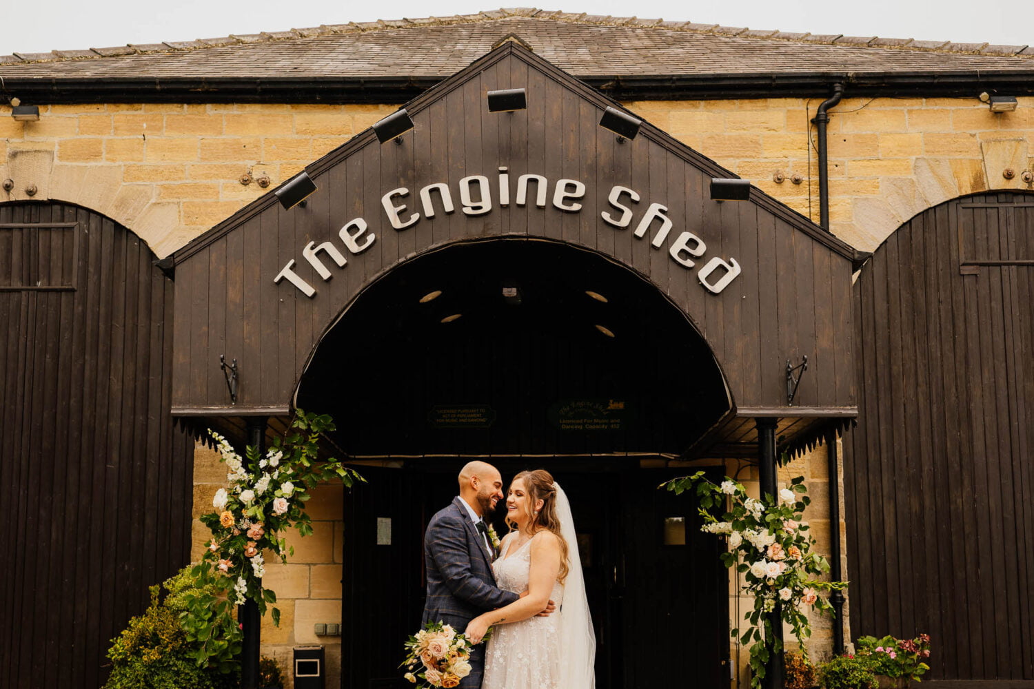 Couple under the enreance of The Engine Shed in Wetherby