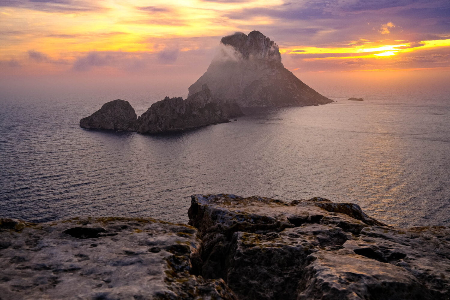 Es Vedra viewpoint on the clifftop at sunset