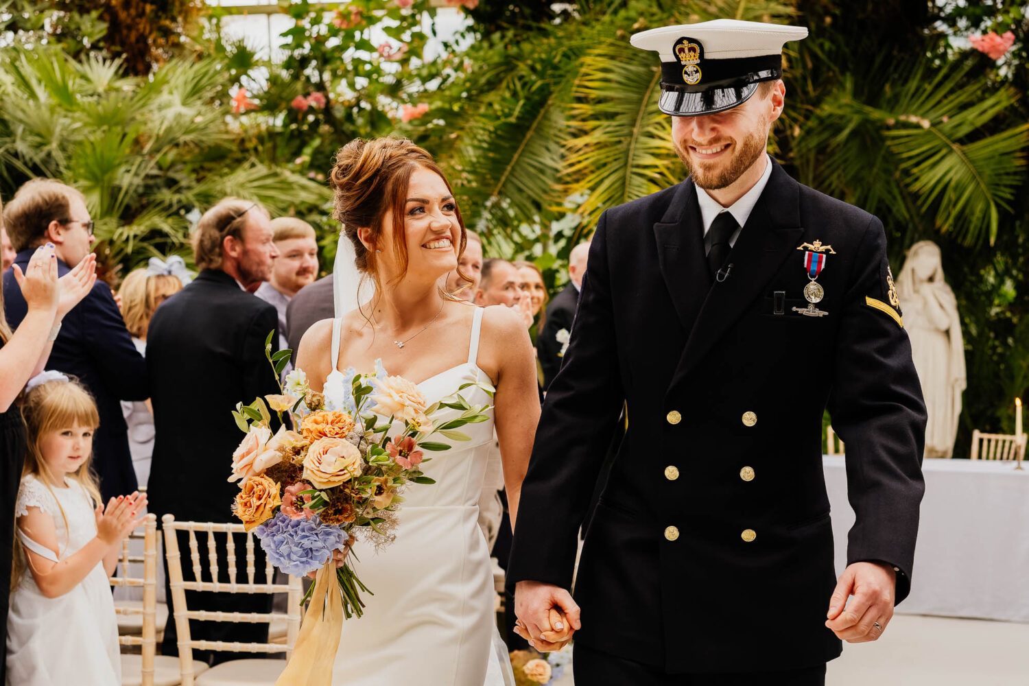 Bride and groom ceremony exit at the Palm House