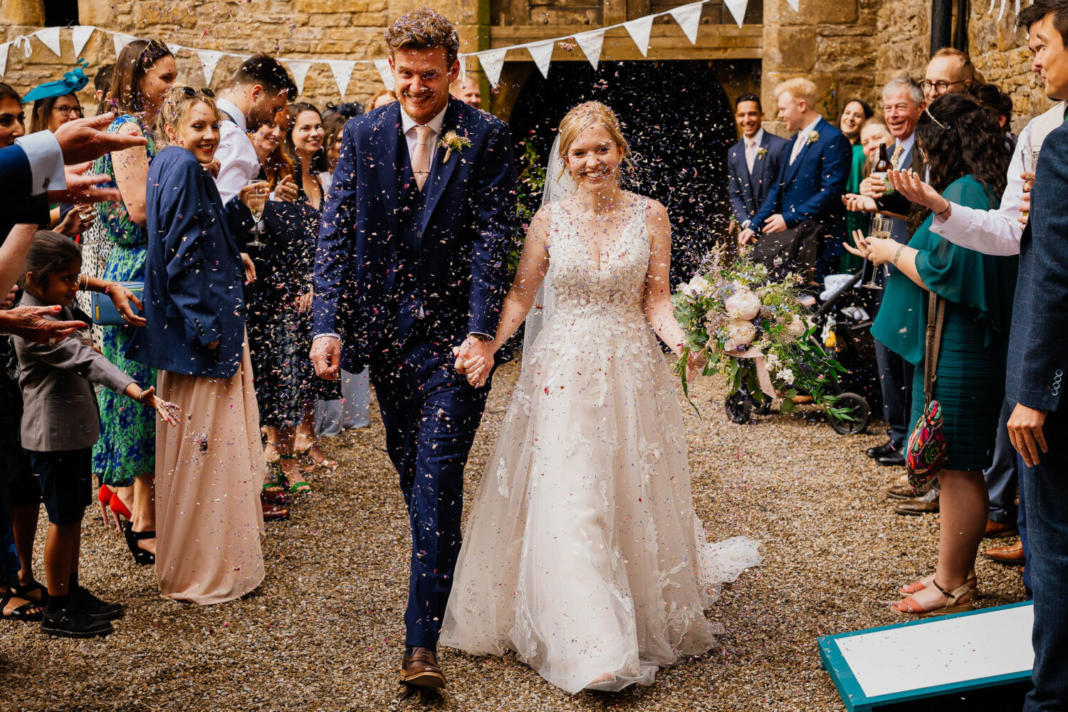 Confetti throw in the courtyard at Bolton Castle