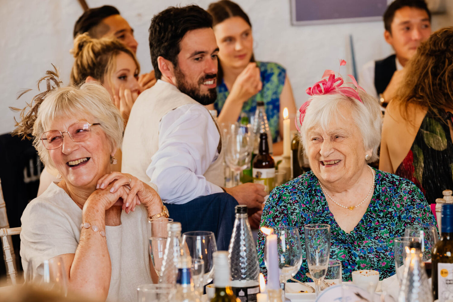 Grandma laughing during wedding speeches