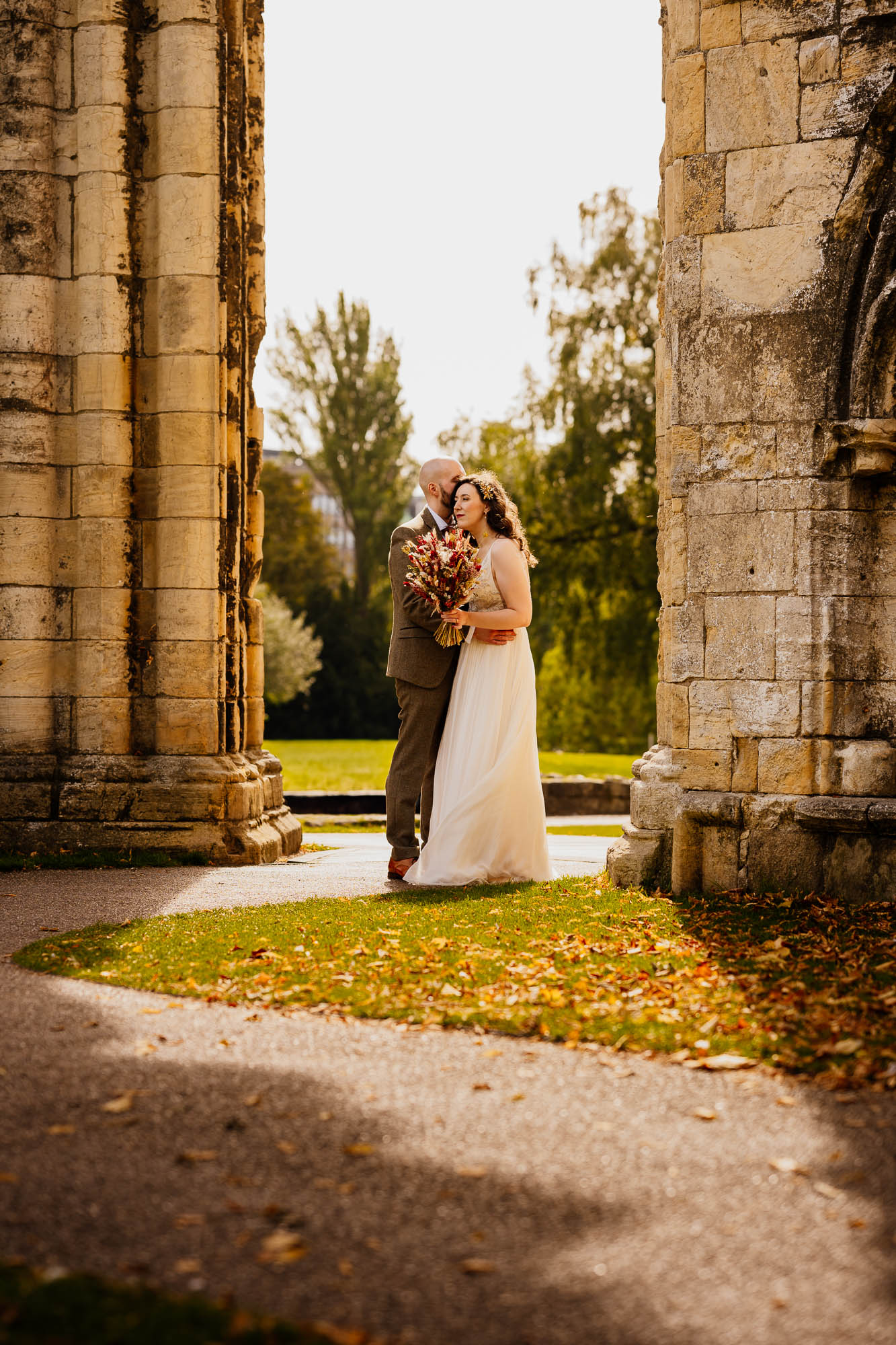 Couple portrait under St Mary's Abbey in York