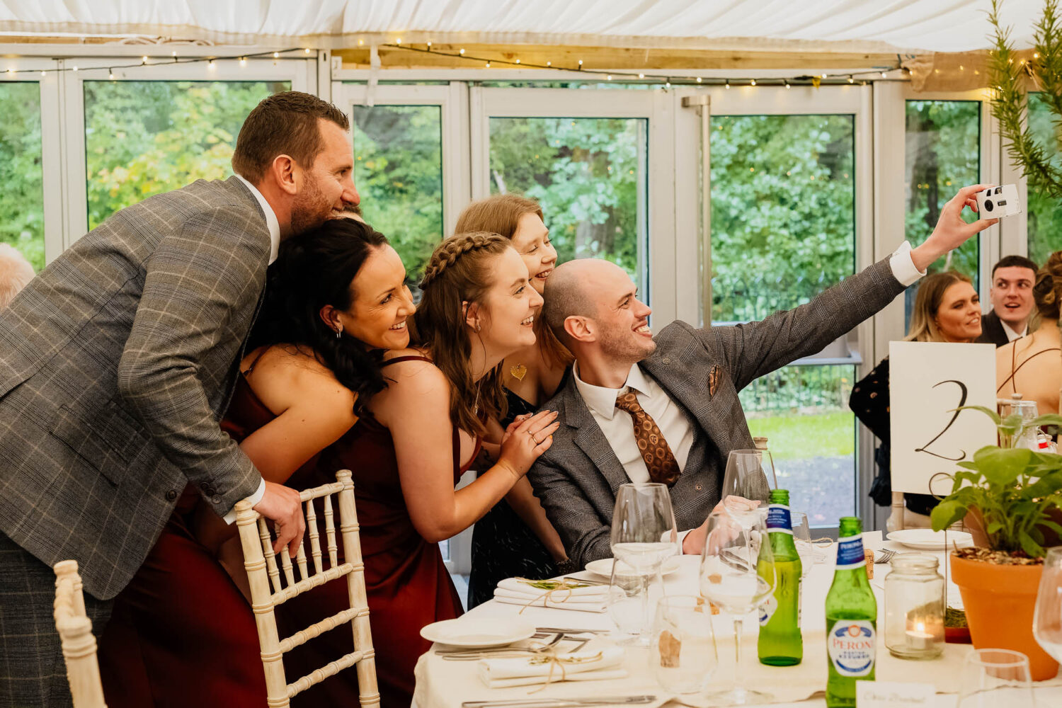 Guests taking at selfie in the Garden room