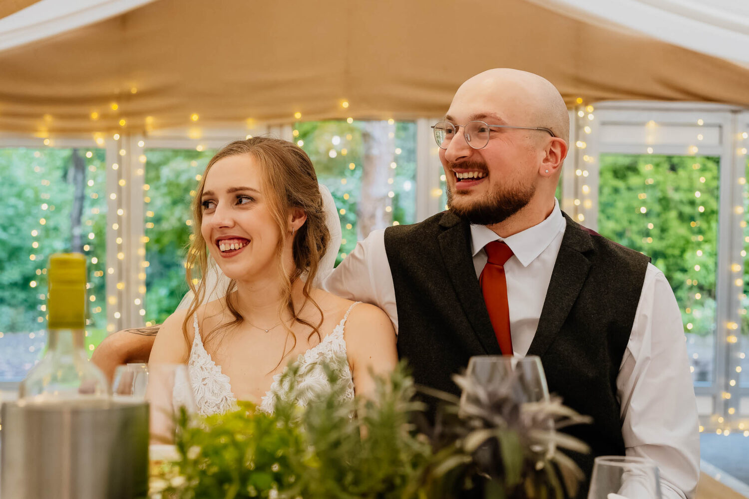 Couple sat together at The Woodman Inn