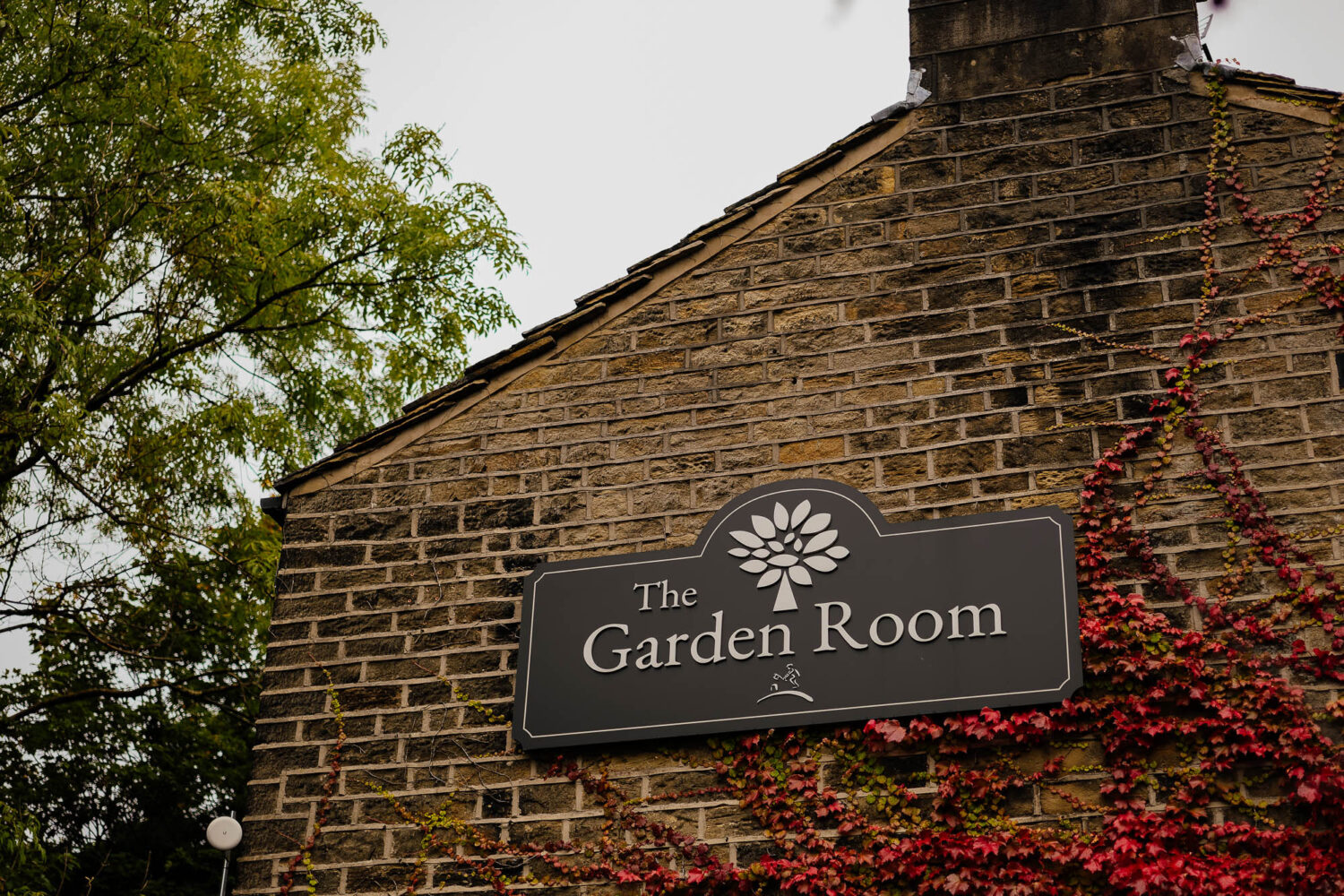 The Garden Room signage at the Woodman Inn