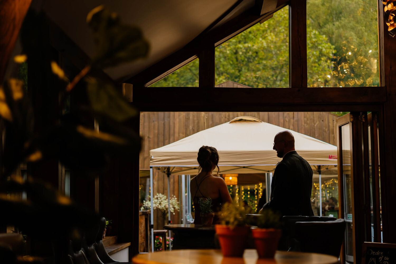Silhouette of guests from the bar