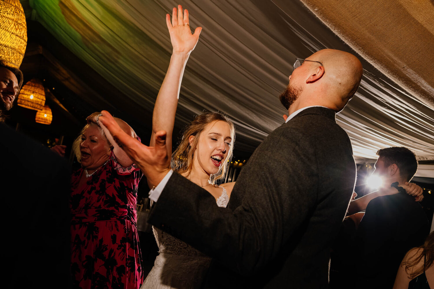 Bride and groom on the dancefloor at The Woodman Inn