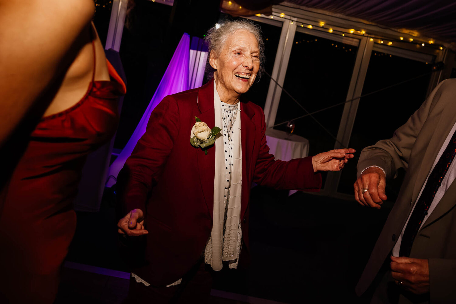 Wedding guest dancing at The Woodman Inn