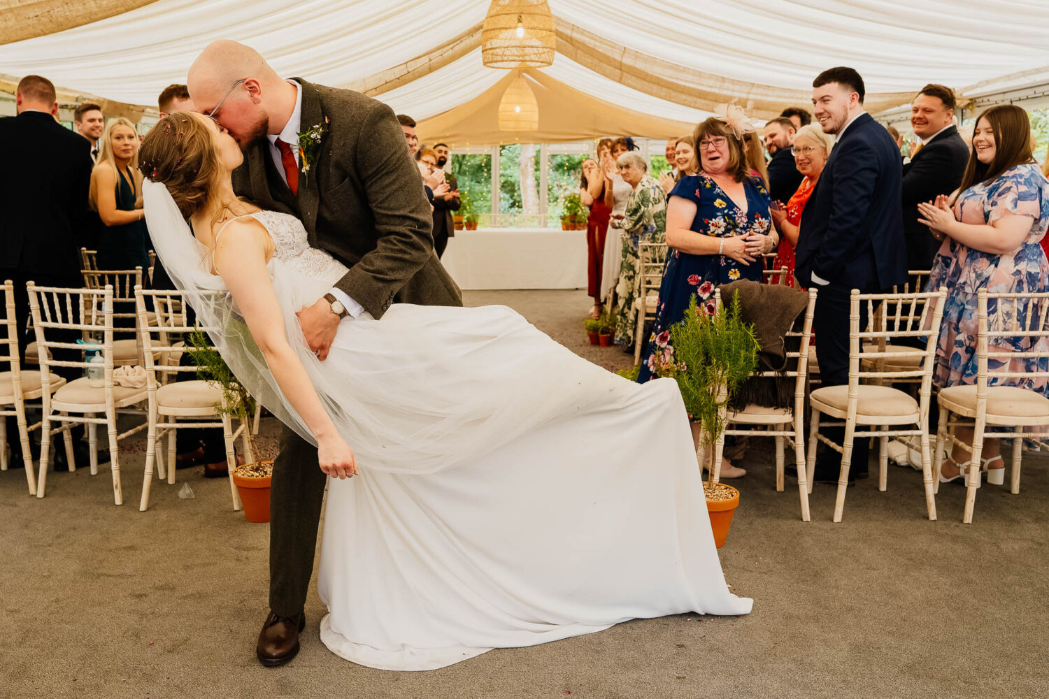 Aisle dip at The Woodman Inn wedding
