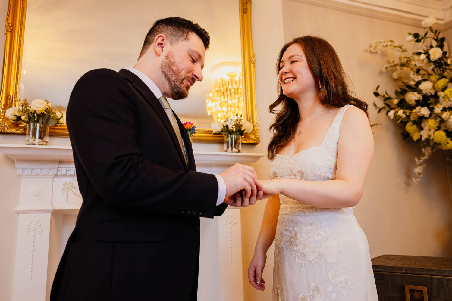 Bride and groom exchange rings at Harrogate Register Office