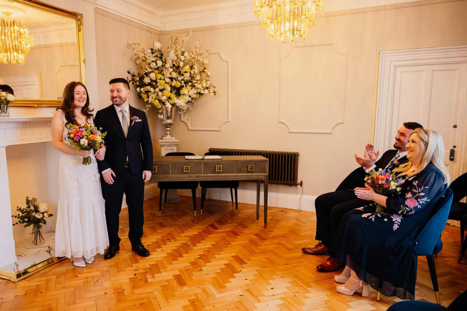 Witnesses clapping couple after Harrogate Register Office ceremony