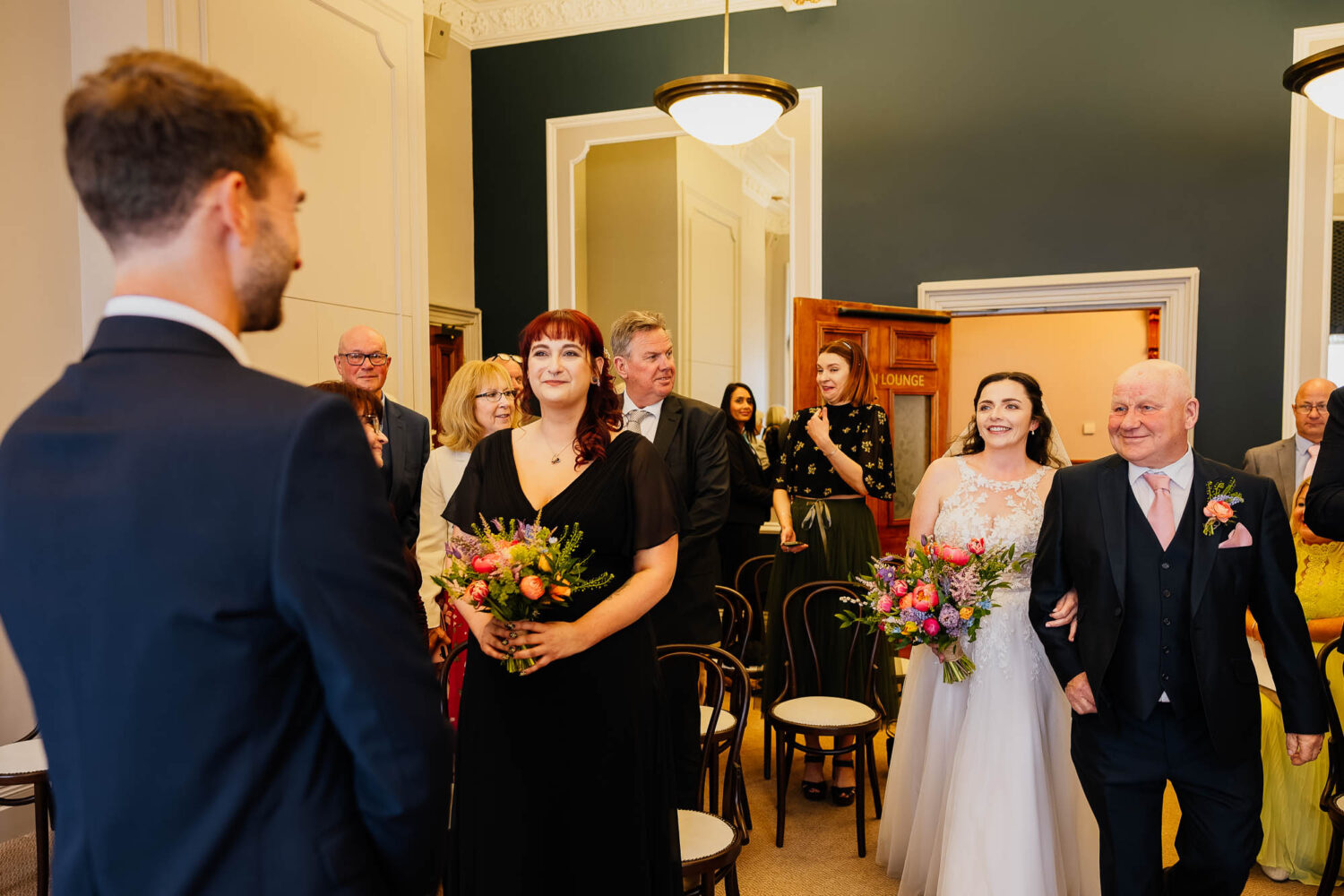 Bride entering ceremony room at Huddersfield Town Hall