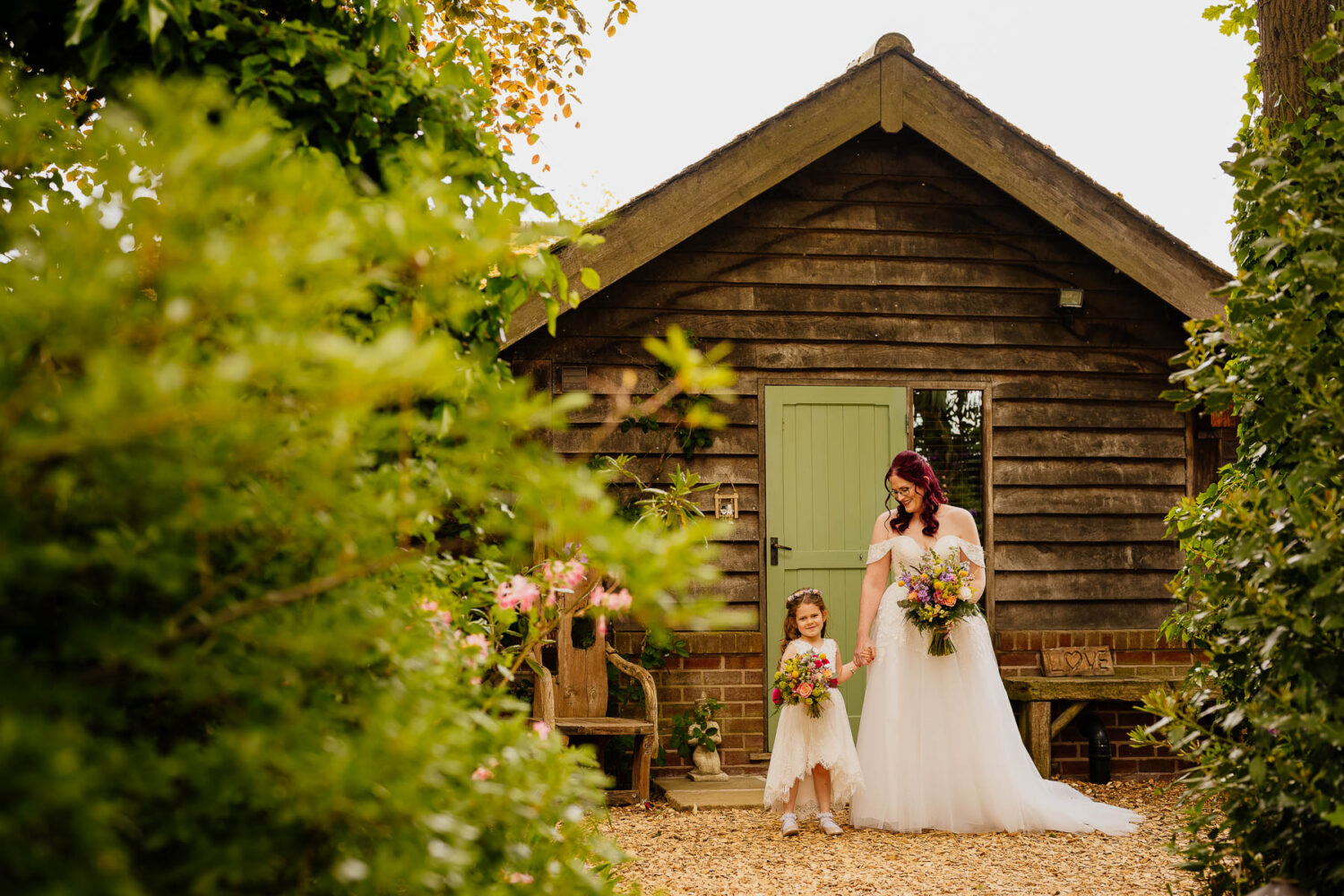Bride and daughter outside The Stables in Moss Wood