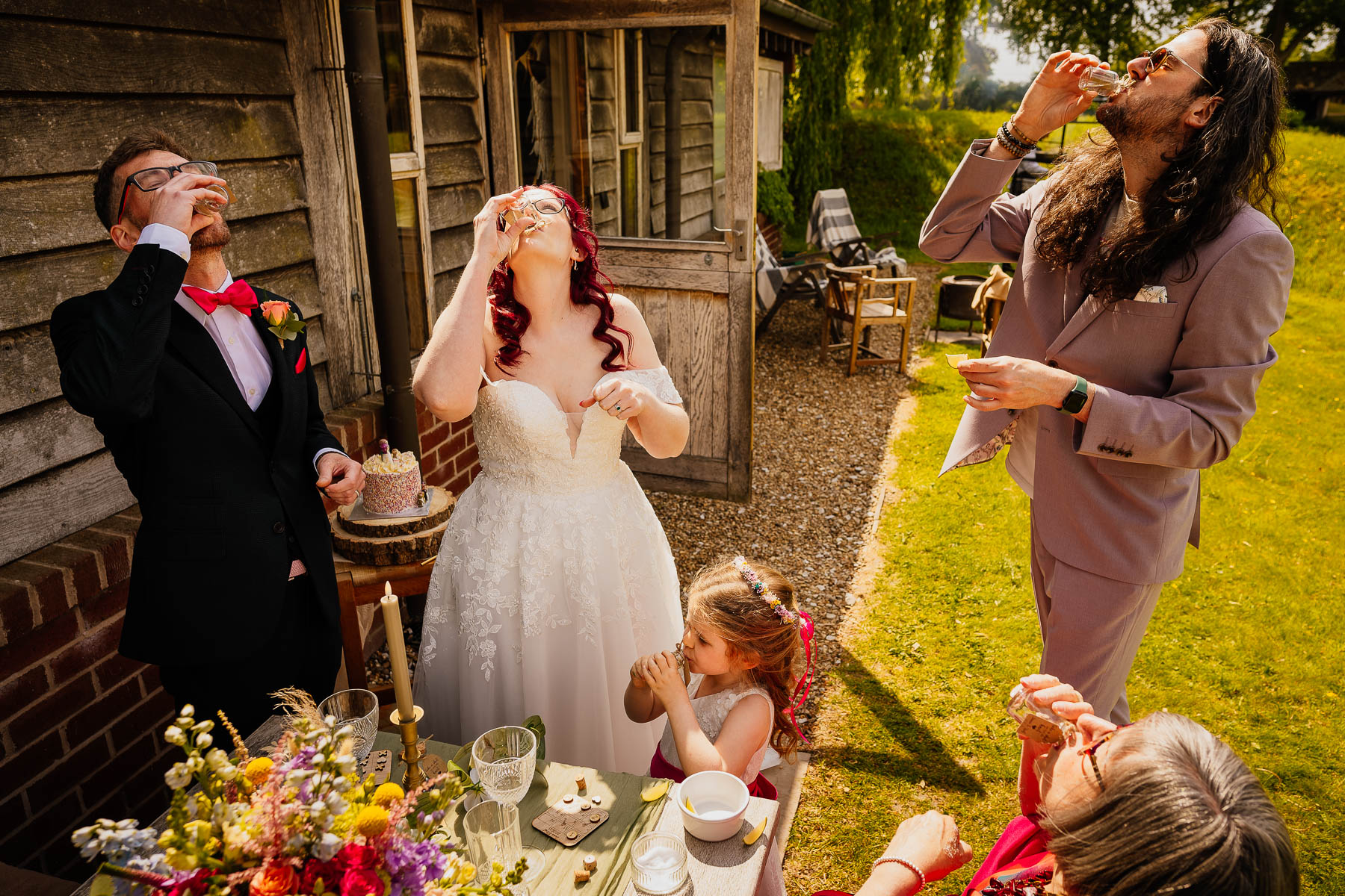 Bride, groom and guests taking shots at The Love Shack