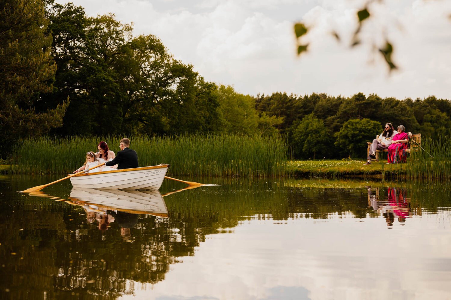 Couple in the love boat at The Love Shack with family watching