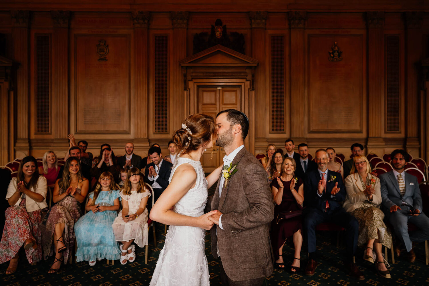 First kiss in the Banquet Hall at Leeds Civic Hall wedding