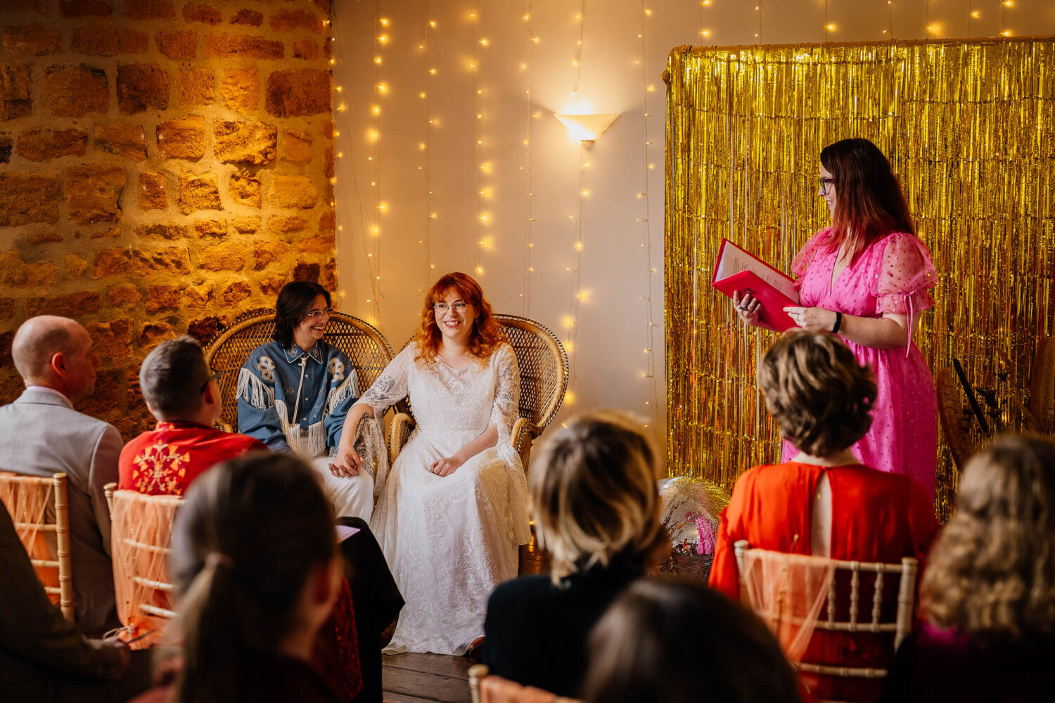 Couple sat in celebrant ceremony