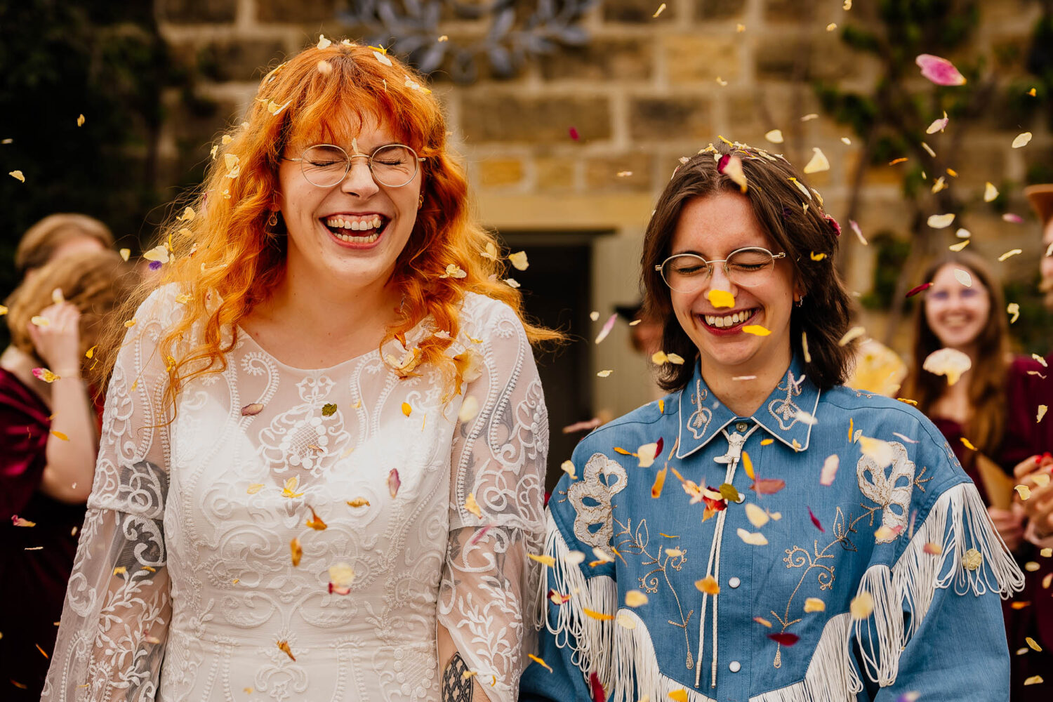 Dried flower confetti with couple smiling