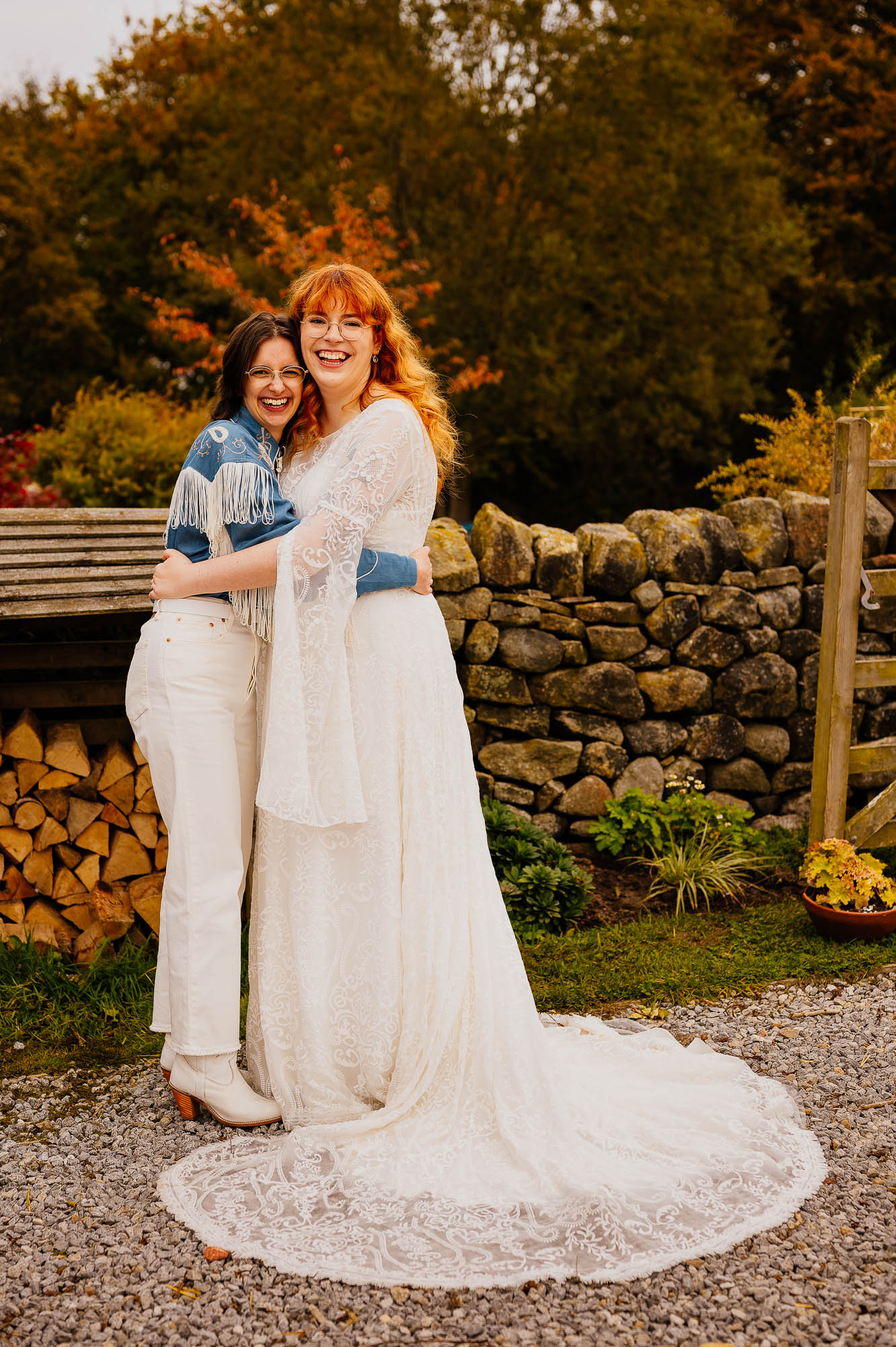 Couple hugging and smiling with autumnal background