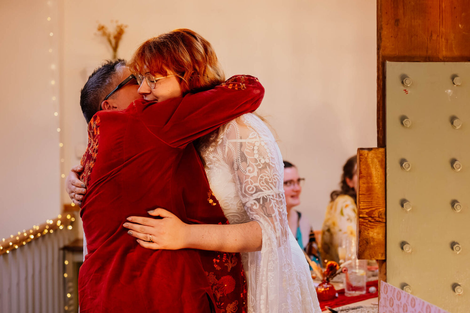 Bride hugging her mum