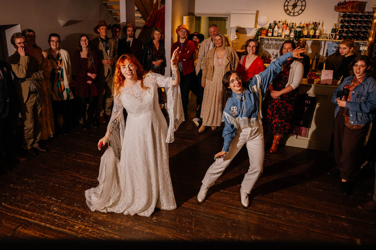 Couple dancing on the nintendo switch with guests watching