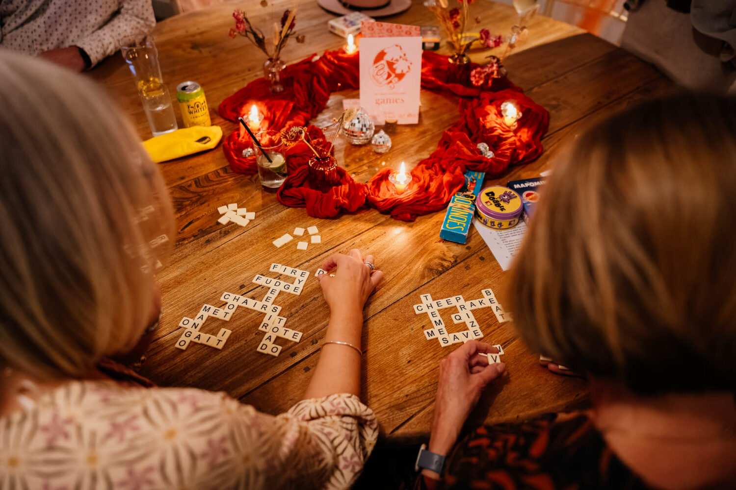 Over the shoulder shot of two people playing a game