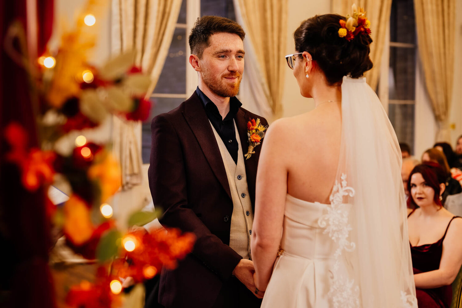 Couple looking at each other during wedding ceremony