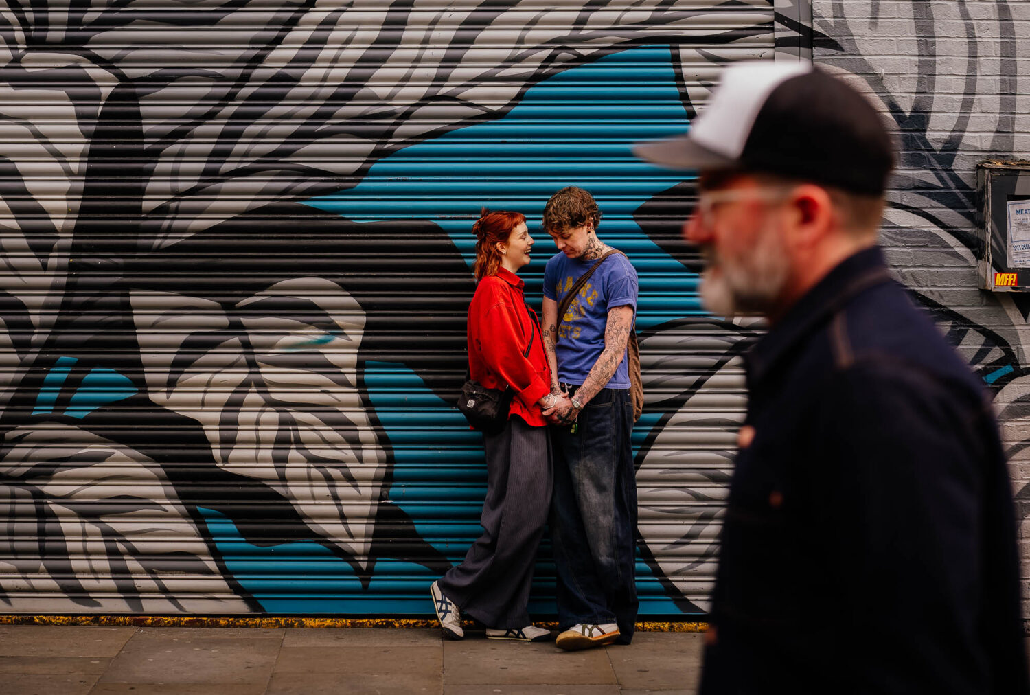 Couple outside Cane and Grain in the Northern Quarter