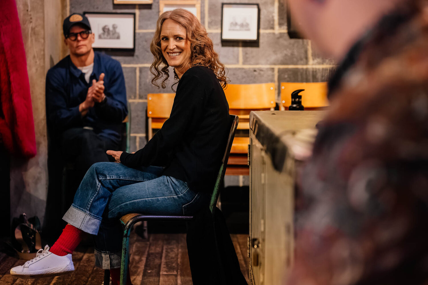 Woman smiling during workshop talk