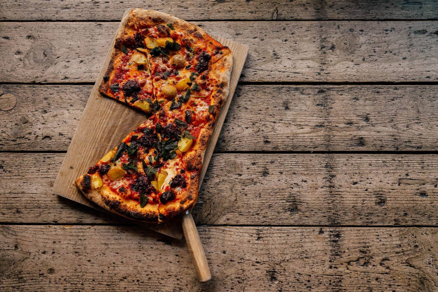 Rectangular pizza on wooden board