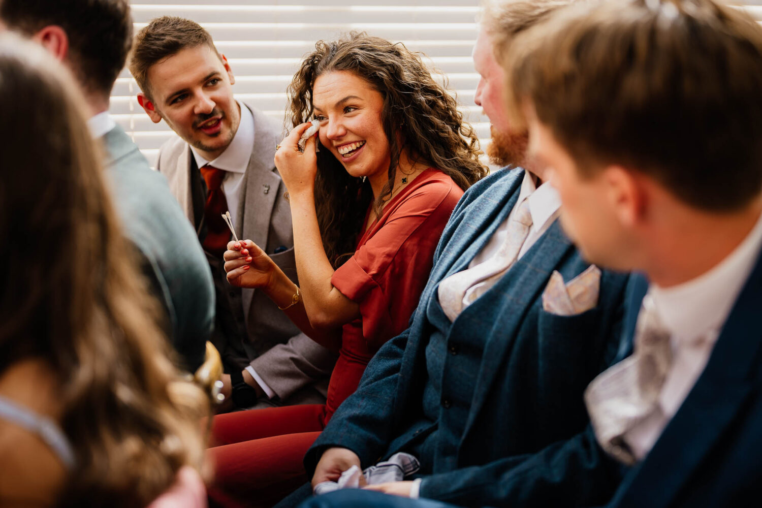 Woman wiping tears away during Faversham wedding