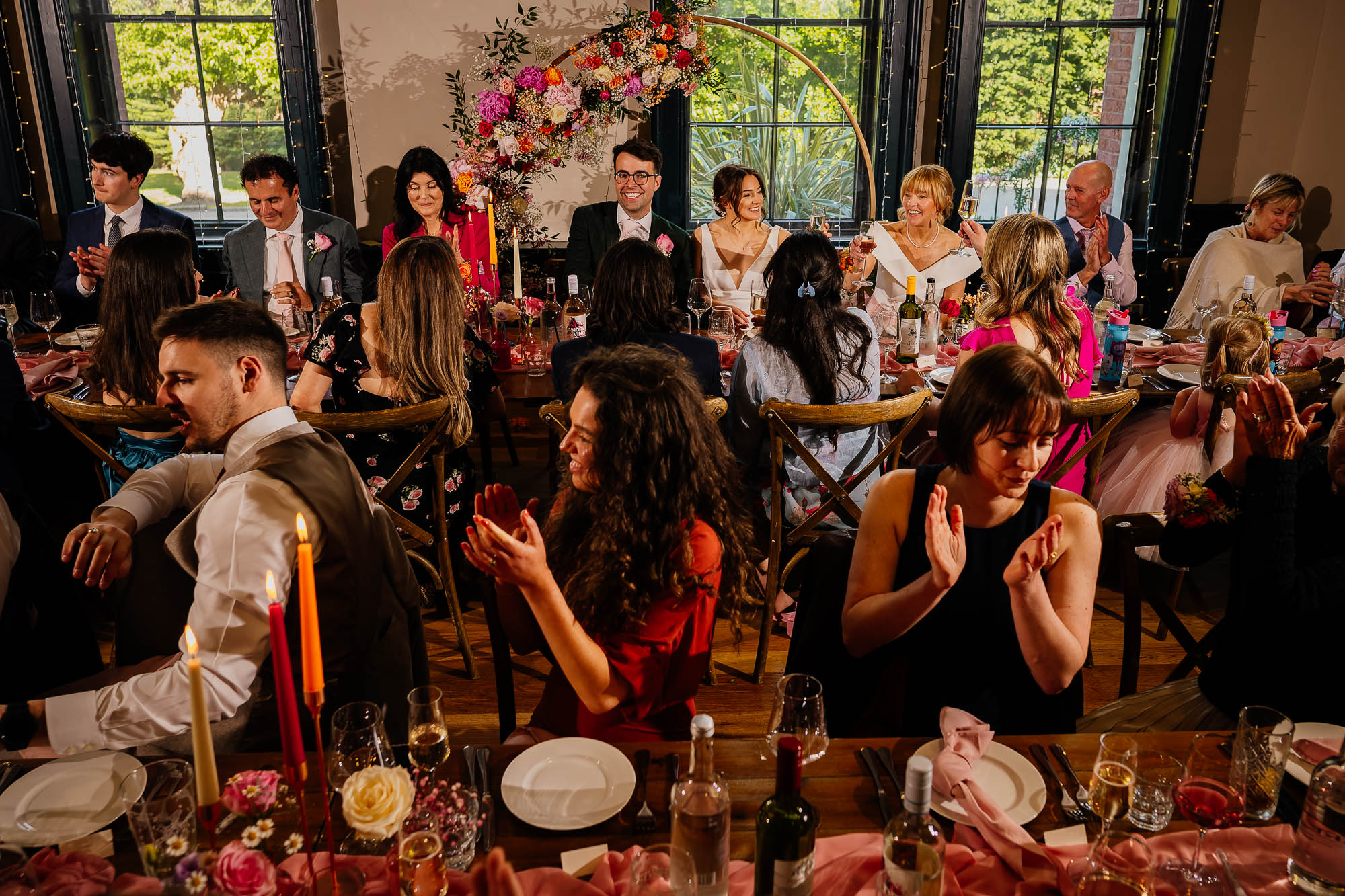 Everyone clapping during wedding speeches at The Faversham