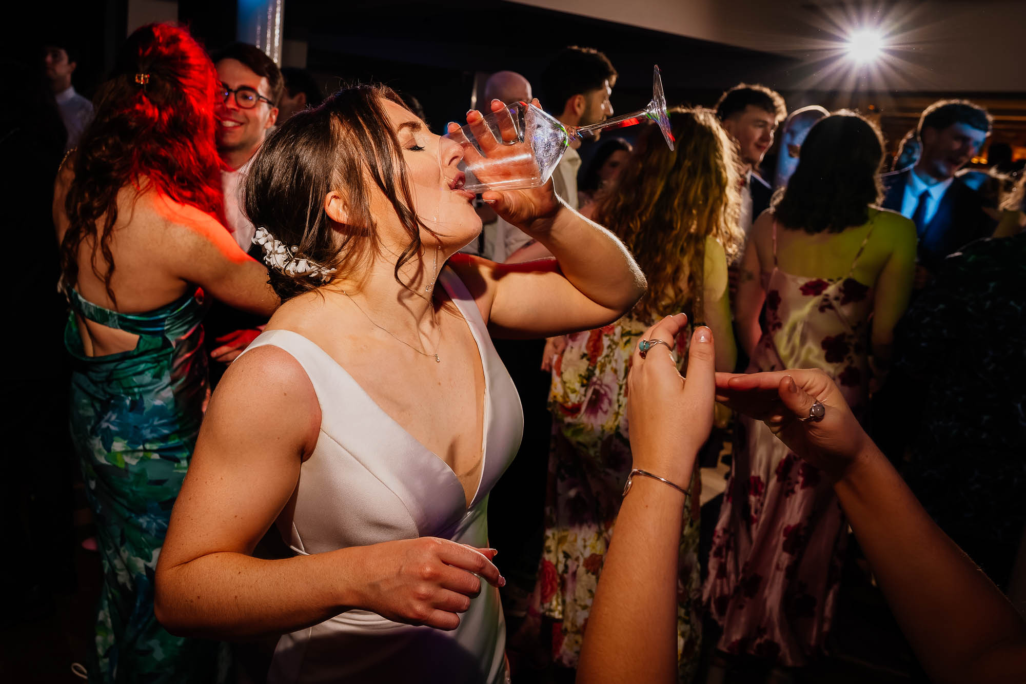 Bride downing wine at their Faversham wedding