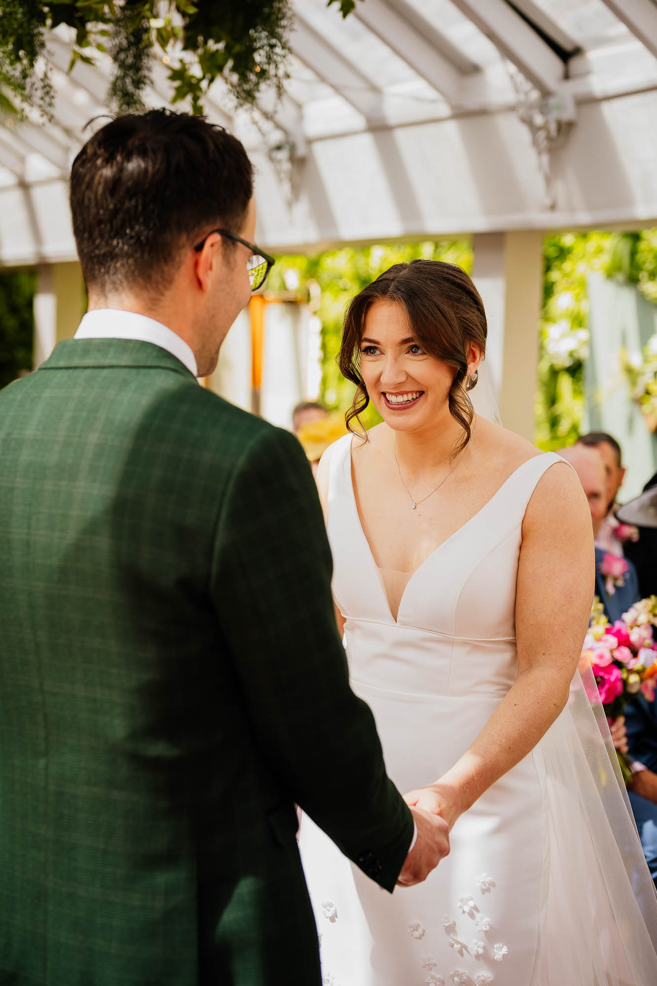 Couple holding hands in wedding ceremony at The Faversham