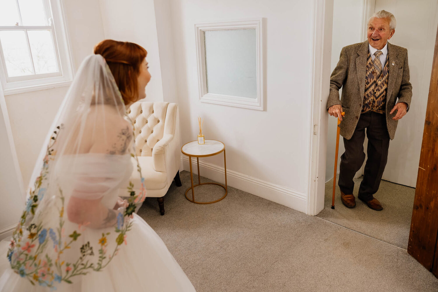 Grandad seeing bride in her dress for the first time at Danby Castle