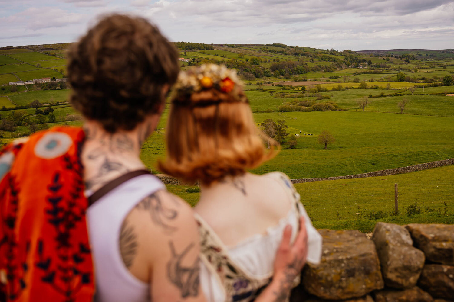 Couple out of focus with view of North York Moors in background