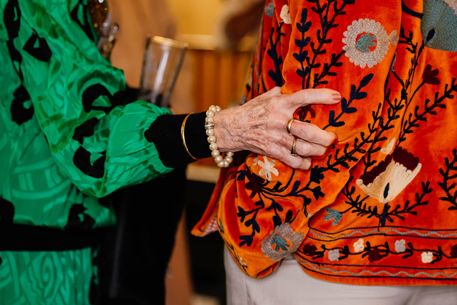 Grandmas hand gripping groom