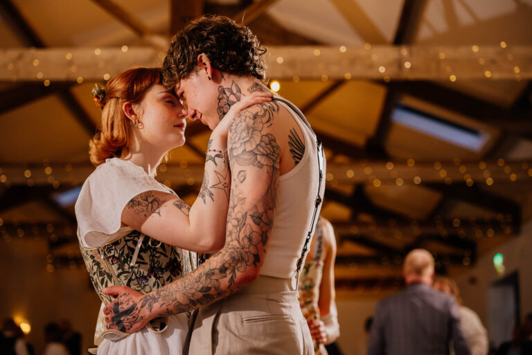 Couple with heads together dancing