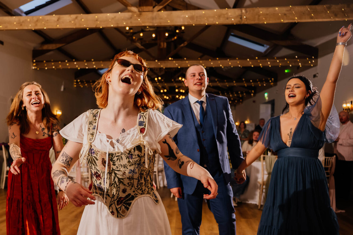People on the dancefloor singing