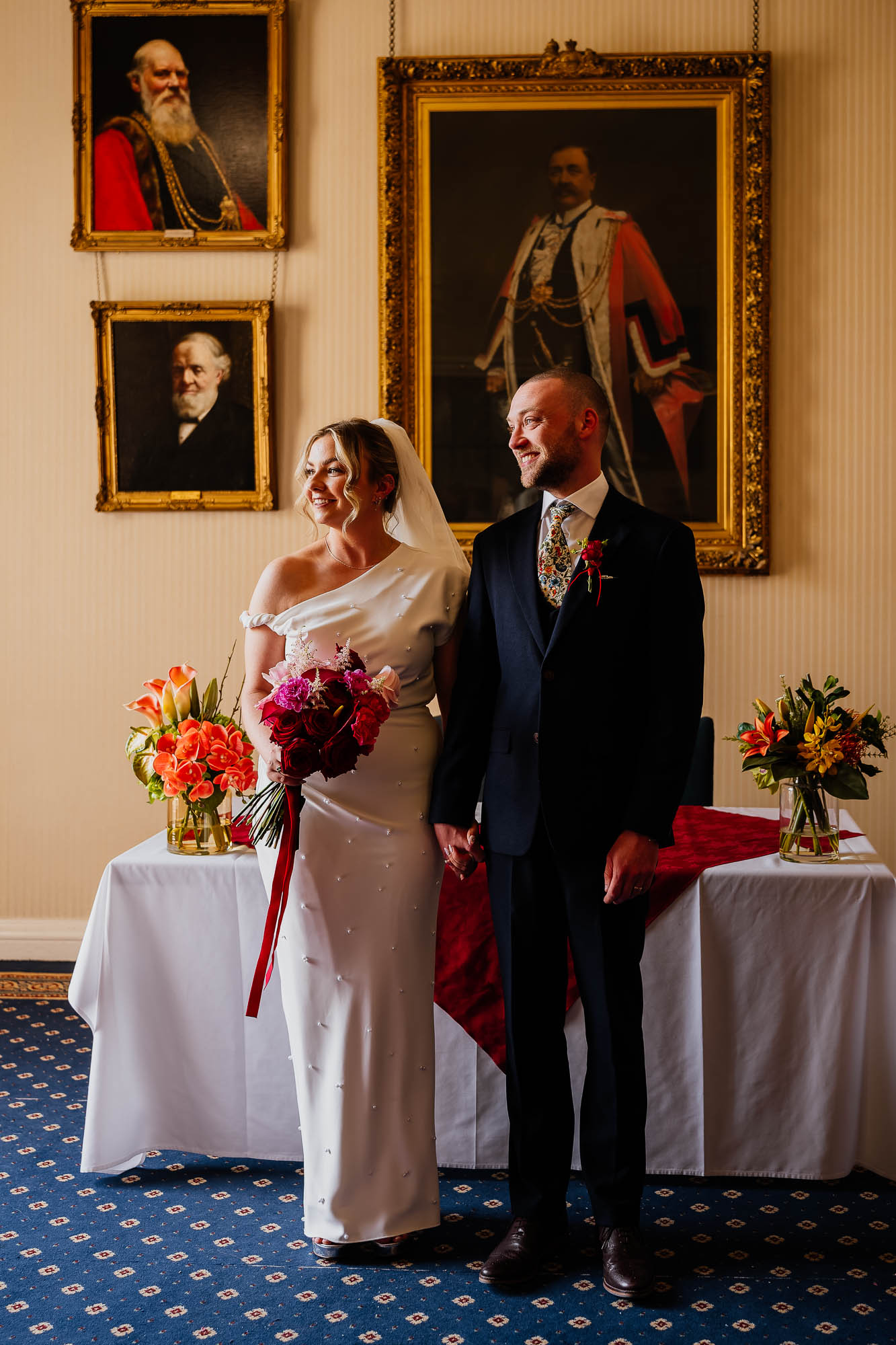 Couple stood in the West Room at Leeds Civic Hall